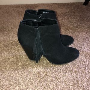 Black ankle boots by Carlo Santana